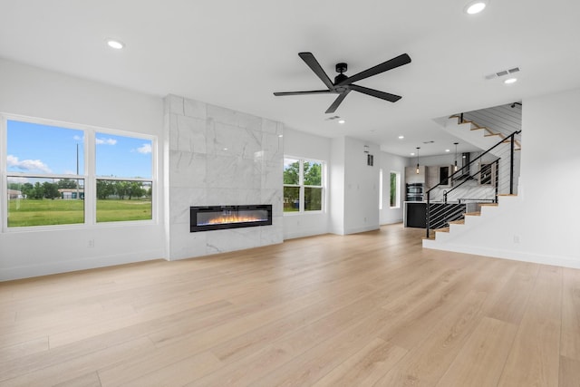 1926 Pueblo St, Dallas, TX 75212 - unfurnished living room with baseboards, ceiling fan, and visible vents