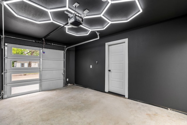 1926 Pueblo St, Dallas, TX 75212 - garage featuring a garage door opener