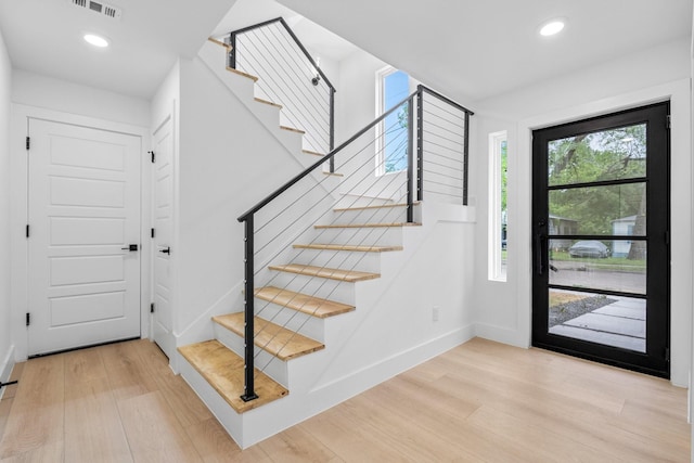 1926 Pueblo St, Dallas, TX 75212 - entryway featuring recessed lighting, baseboards, light wood-type flooring, visible vents, and stairway