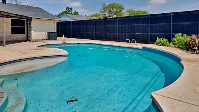 2300 Anders Dr, Mesquite, TX 75150 - view of swimming pool featuring cooling unit, fence, a patio, and a fenced in pool