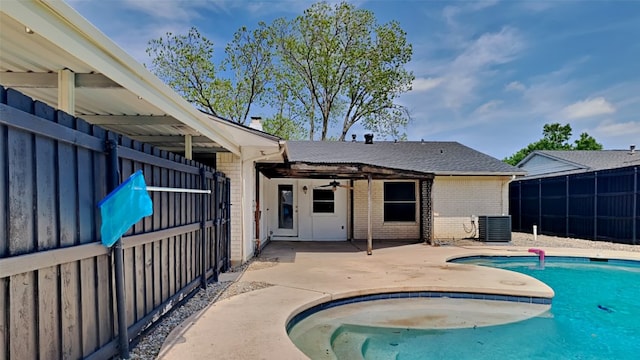 2300 Anders Dr, Mesquite, TX 75150 - pool with fence, ceiling fan, cooling unit, and a patio