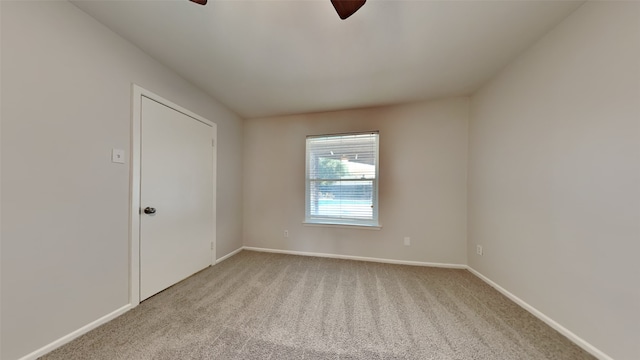 2300 Anders Dr, Mesquite, TX 75150 - spare room featuring carpet, baseboards, and ceiling fan