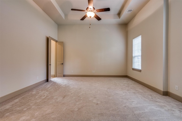 4312 Blue Quail Dr, Mckinney, TX 75072 - unfurnished room with a tray ceiling, light colored carpet, and ceiling fan