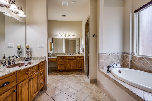 4312 Blue Quail Dr, Mckinney, TX 75072 - bathroom with plenty of natural light, tile patterned floors, a shower stall, and a bath