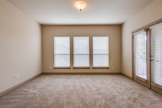 4312 Blue Quail Dr, Mckinney, TX 75072 - carpeted spare room featuring baseboards
