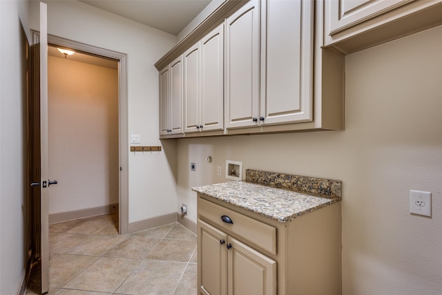 4312 Blue Quail Dr, Mckinney, TX 75072 - laundry area featuring hookup for an electric dryer, cabinet space, washer hookup, and baseboards
