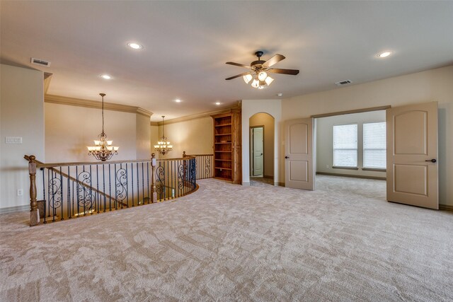 4312 Blue Quail Dr, Mckinney, TX 75072 - unfurnished room with a chandelier, carpet flooring, a ceiling fan, arched walkways, and recessed lighting