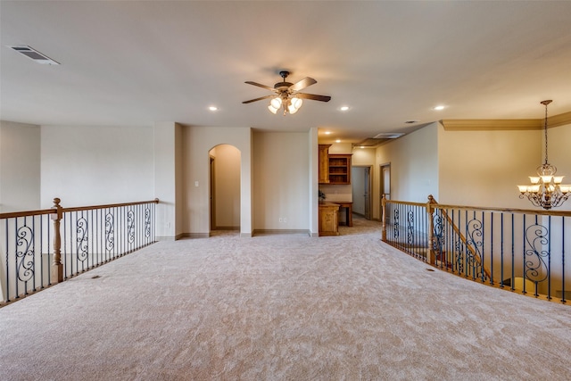 4312 Blue Quail Dr, Mckinney, TX 75072 - empty room featuring a ceiling fan, arched walkways, a chandelier, light carpet, and recessed lighting