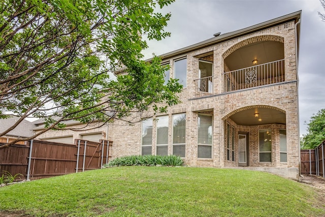 4312 Blue Quail Dr, Mckinney, TX 75072 - back of house with brick siding and a balcony