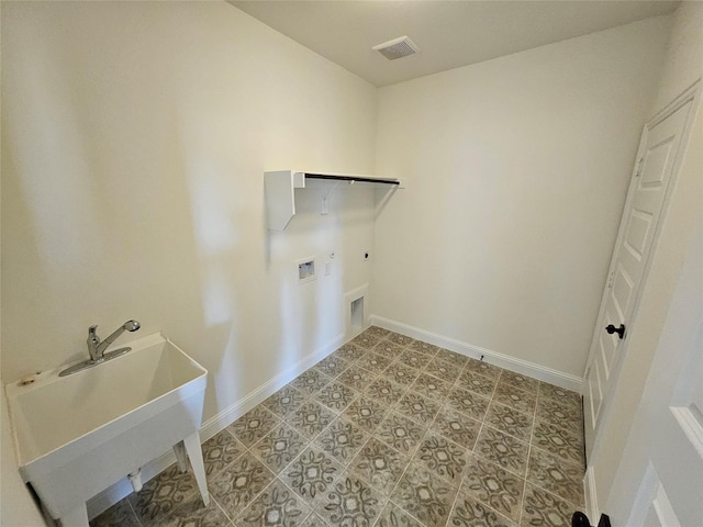 laundry room featuring baseboards, visible vents, washer hookup, electric dryer hookup, and laundry area