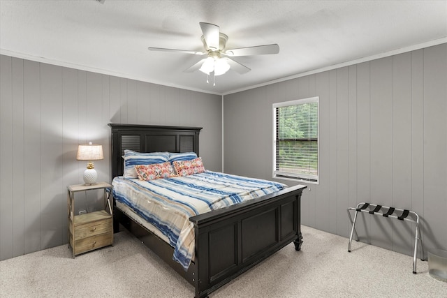 230 W Sesame St, Karnack, TX 75661 - bedroom with light carpet and a ceiling fan