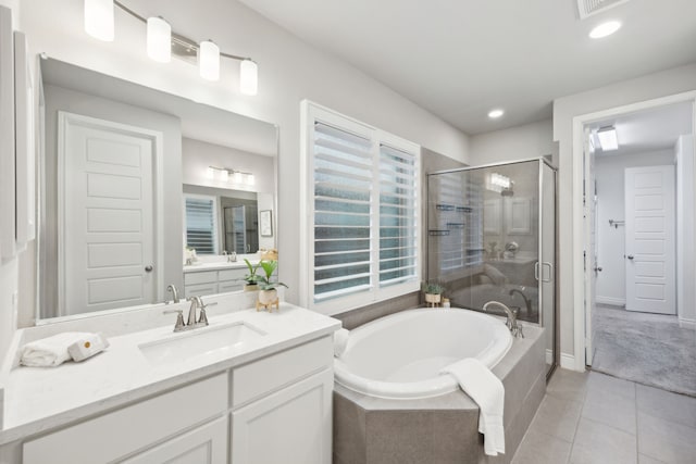 8517 Holliday Creek Way, Mckinney, TX 75071 - full bath featuring a shower stall, a bath, tile patterned floors, vanity, and recessed lighting