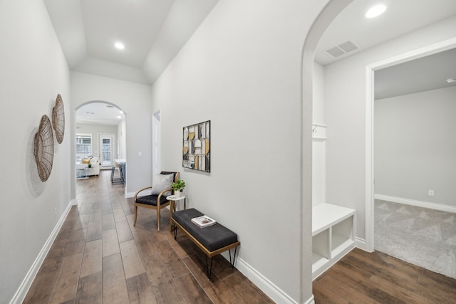 8517 Holliday Creek Way, Mckinney, TX 75071 - corridor featuring arched walkways, dark wood-style floors, recessed lighting, and baseboards