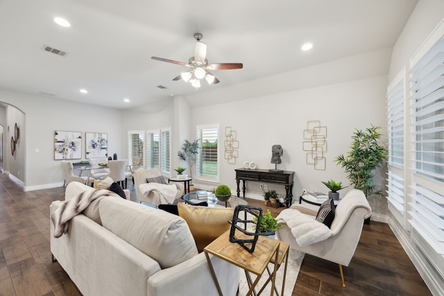8517 Holliday Creek Way, Mckinney, TX 75071 - living area with arched walkways, baseboards, recessed lighting, dark wood-style floors, and a ceiling fan