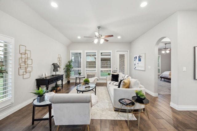 8517 Holliday Creek Way, Mckinney, TX 75071 - living area with ceiling fan, baseboards, dark wood-type flooring, recessed lighting, and arched walkways