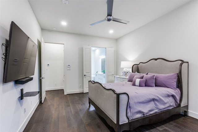 bedroom with baseboards, ensuite bathroom, wood finished floors, and recessed lighting