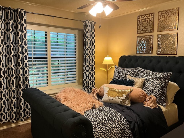 1302 Summit Dr, Mexia, TX 76667 - bedroom with carpet floors, crown molding, and a ceiling fan