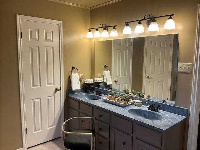 1302 Summit Dr, Mexia, TX 76667 - bathroom featuring ornamental molding, a sink, and double vanity