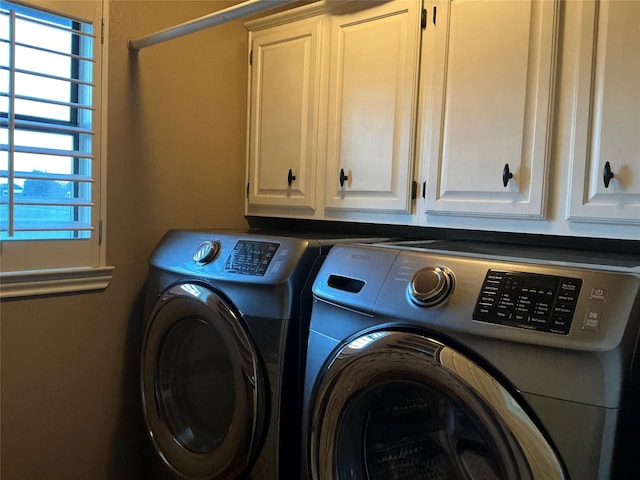 1302 Summit Dr, Mexia, TX 76667 - laundry room with washing machine and dryer and cabinet space