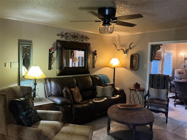 1302 Summit Dr, Mexia, TX 76667 - tiled living room featuring ceiling fan, a textured ceiling, and ornamental molding
