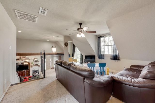 3408 Fm 2280, Cleburne, TX 76031 - living area with ceiling fan, light carpet, lofted ceiling, baseboards, and a textured ceiling