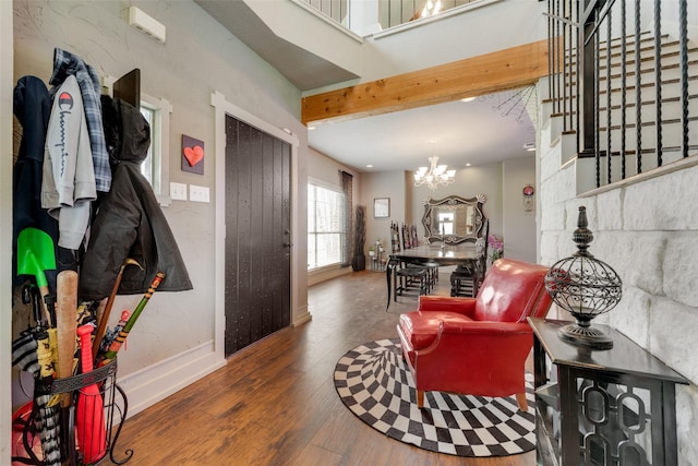 3408 Fm 2280, Cleburne, TX 76031 - living room featuring wood finished floors, a chandelier, and baseboards