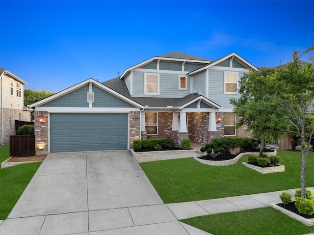 4409 Switchgrass St, Celina, TX 75009 - craftsman-style house with a shingled roof, a front lawn, an attached garage, driveway, and brick siding