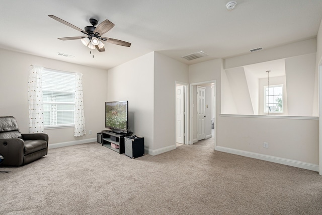 4409 Switchgrass St, Celina, TX 75009 - living area featuring baseboards, a ceiling fan, visible vents, and carpet
