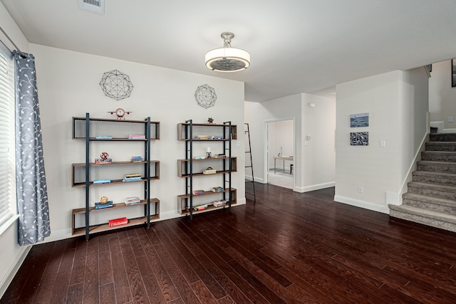 4409 Switchgrass St, Celina, TX 75009 - interior space with stairs, wood finished floors, visible vents, and baseboards