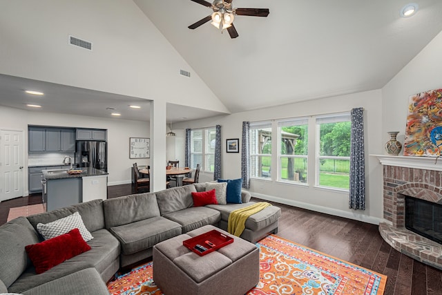 4409 Switchgrass St, Celina, TX 75009 - living room featuring visible vents, a ceiling fan, baseboards, and dark wood-style flooring