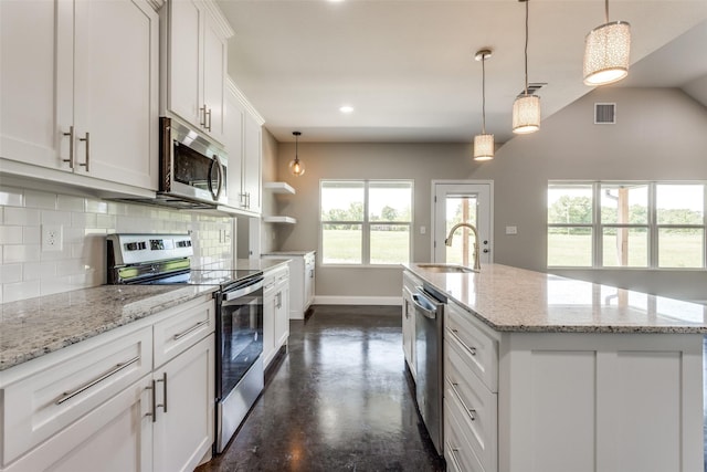 kitchen with tasteful backsplash, a sink, baseboards, concrete floors, and stainless steel appliances