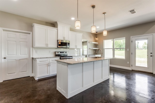 kitchen with a sink, appliances with stainless steel finishes, concrete flooring, and visible vents