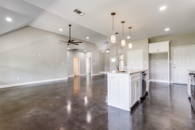 kitchen with visible vents, concrete flooring, white cabinets, light stone counters, and a sink