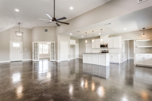 unfurnished living room with visible vents, baseboards, ceiling fan, french doors, and concrete floors