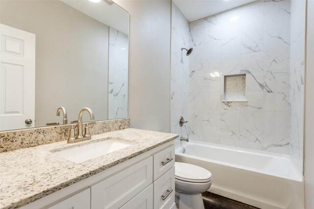 full bathroom with shower / bathtub combination, toilet, and vanity