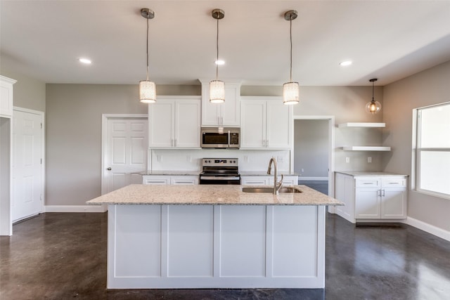 kitchen featuring a sink, baseboards, stainless steel appliances, and finished concrete floors