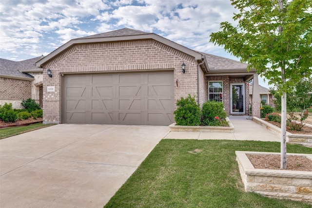 1232 Bright Stars Dr, Little Elm, TX 76227 - ranch-style home featuring an attached garage, a shingled roof, a front lawn, brick siding, and driveway