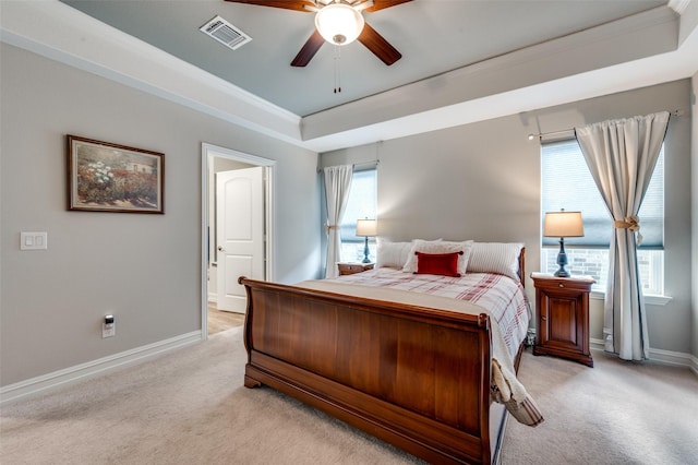 1232 Bright Stars Dr, Little Elm, TX 76227 - bedroom with a tray ceiling, crown molding, visible vents, baseboards, and light carpet