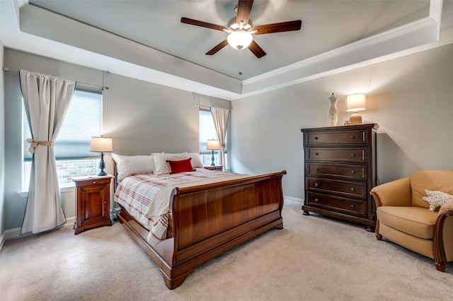1232 Bright Stars Dr, Little Elm, TX 76227 - bedroom featuring multiple windows, a tray ceiling, crown molding, and light colored carpet