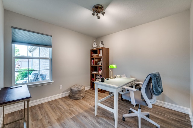 1232 Bright Stars Dr, Little Elm, TX 76227 - home office featuring baseboards and wood finished floors