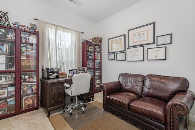 office space with carpet floors and visible vents