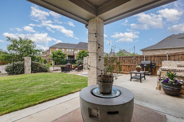 view of patio / terrace featuring a fenced backyard and a grill