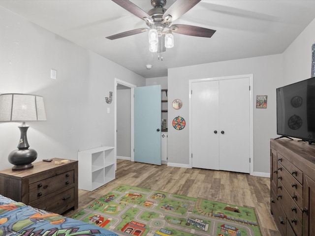 81 Regents Park, Bedford, TX 76022 - bedroom with wood finished floors, baseboards, a ceiling fan, and a closet