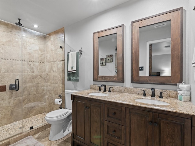 81 Regents Park, Bedford, TX 76022 - full bathroom with double vanity, a shower stall, and recessed lighting
