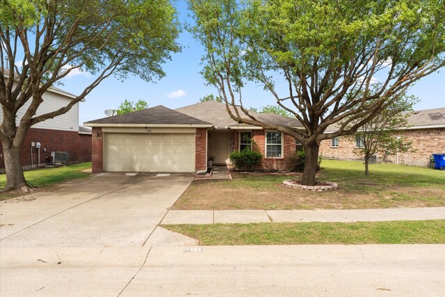 1142 Singletree Dr, Forney, TX 75126 - ranch-style house featuring a garage, brick siding, a front yard, and concrete driveway