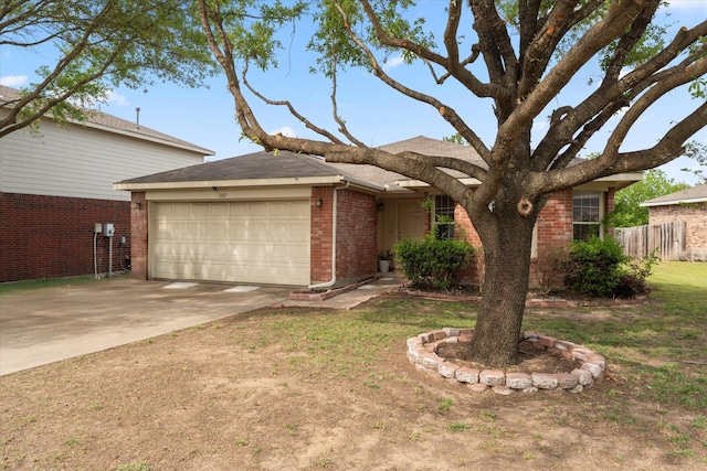 1142 Singletree Dr, Forney, TX 75126 - view of front of property featuring brick siding, a garage, and concrete driveway
