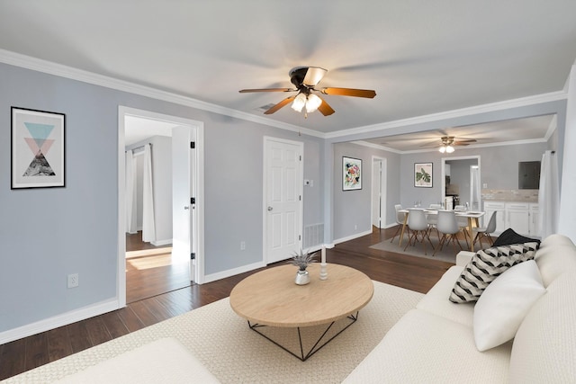 2916 Livingston Ave, Fort Worth, TX 76110 - living room with dark wood-type flooring, ceiling fan, baseboards, and crown molding