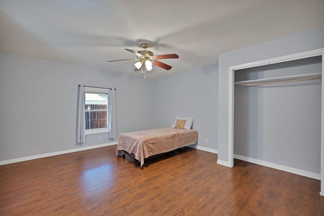 2916 Livingston Ave, Fort Worth, TX 76110 - bedroom with wood finished floors, baseboards, a closet, and a ceiling fan