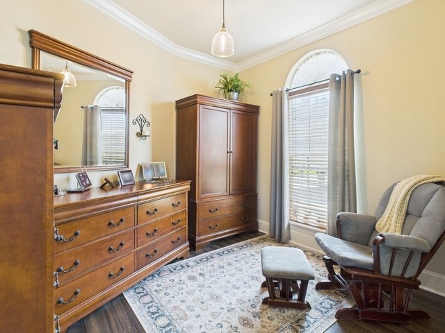 118 Chickadee Dr, Whitehouse, TX 75791 - living area with dark wood-style flooring, a wealth of natural light, and crown molding