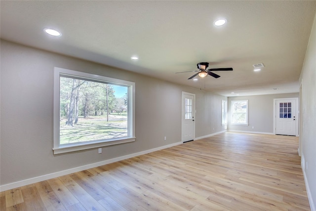 unfurnished living room with light wood-style floors, ceiling fan, baseboards, visible vents, and recessed lighting